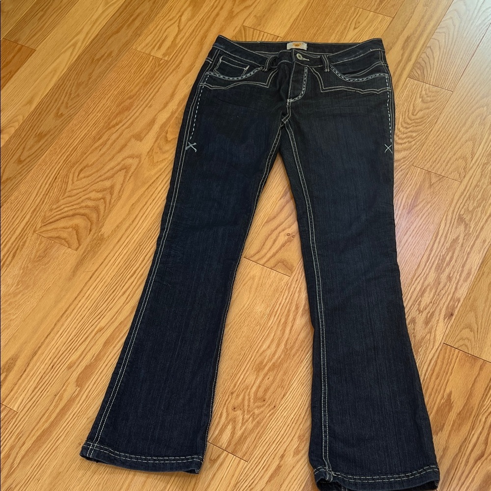 Anti Batik women’s jeans size 29, with stitching and embroidered pockets.